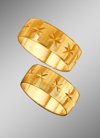 Trouwring met diamantierg met diamanté groeven en kleine sterren