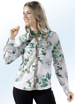 Blouse met opvallende dierenhuidgarnering
