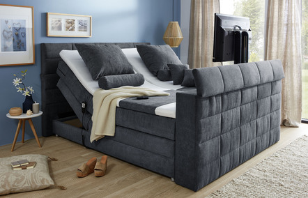 Boxspringbed met elektrisch intrekbare tv-houder