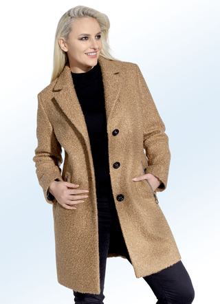 Korte jas in 2 kleuren met een trendy gekrulde look