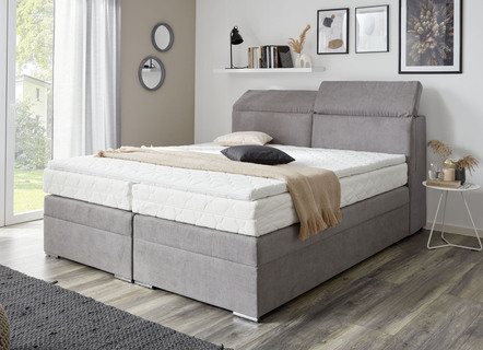 Bed met opbergruimte in het hoofdeinde