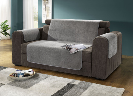 Tweezijdige beschermer van fauteuil, bank en armleuning