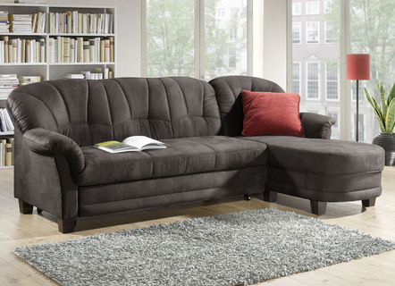 Comfortabel gestoffeerd hoekmeubel met bedfunctie