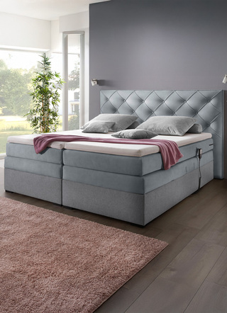 Modernes Boxspringbett mit Motor – elektrisch verstellbar per Fernbedienung