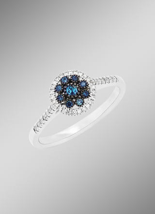 Mooie damesring met blauwe diamanten en witte diamanten