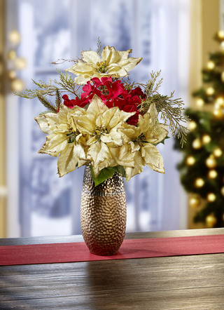 Kerstster-bloemstuk in vaas
