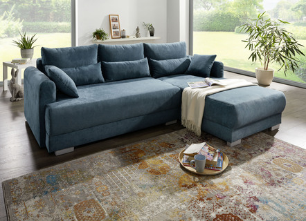 Hoekbank met slaapfunctie en decoratieve kussens