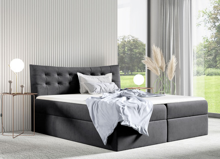 Boxspring bed met 2 bedlades en topper