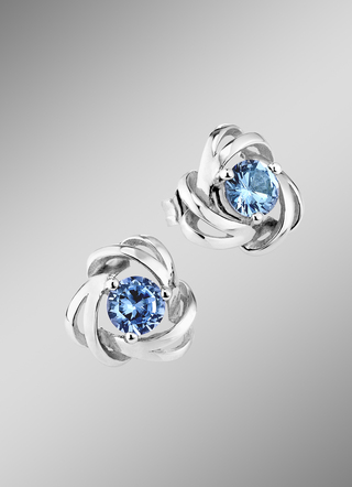 Oorstekers met blauwe topaas