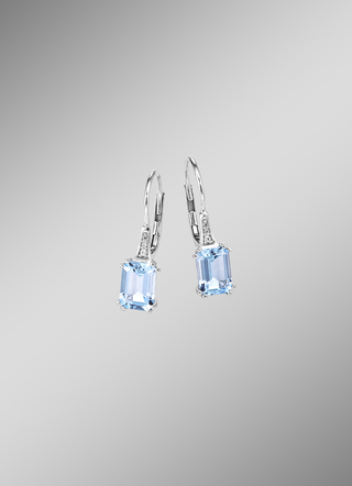 Oorbellen met diamanten en blauwe topaas