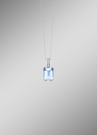Hanger met diamanten en blauwe topaas
