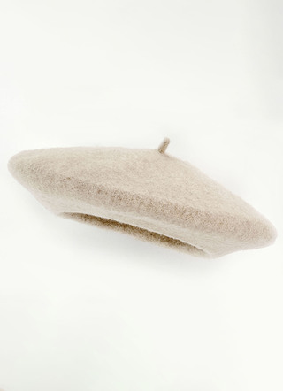 Elegante damesbaret, met gekookte wol