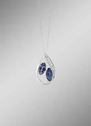 Elegantie in druppelvorm: hanger met saffier en 4 briljant geslepen diamanten