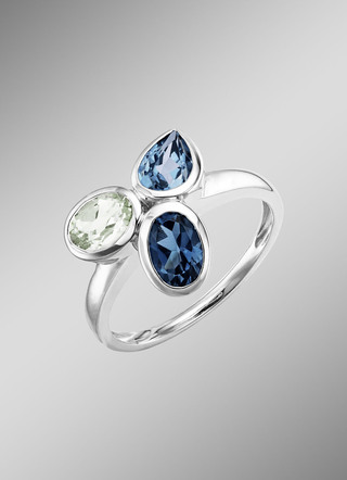 Harmonie van kleuren: damesring met blauwe topazen en groene amethist