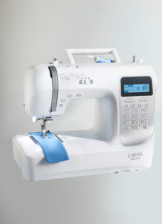 Geautomatiseerde naaimachine met vrije arm