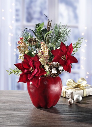 Kerstster in appelpot