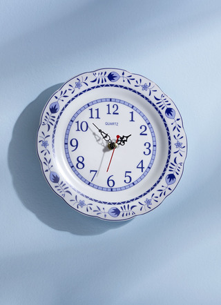Wandklok met ui patroon decor