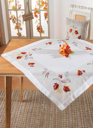 Geborduurde tafel- en kamerdecoratie
