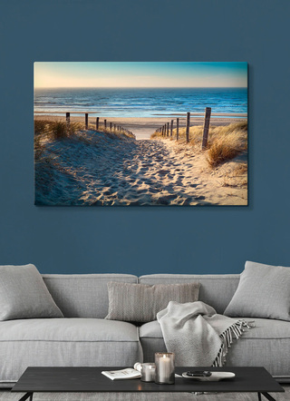 Canvas print Pad naar het Noordzeestrand in een gouden zonsondergang