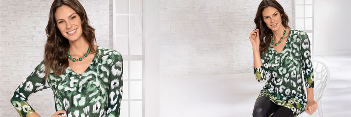 Dame met groen-witte tuniek en zwarte broek