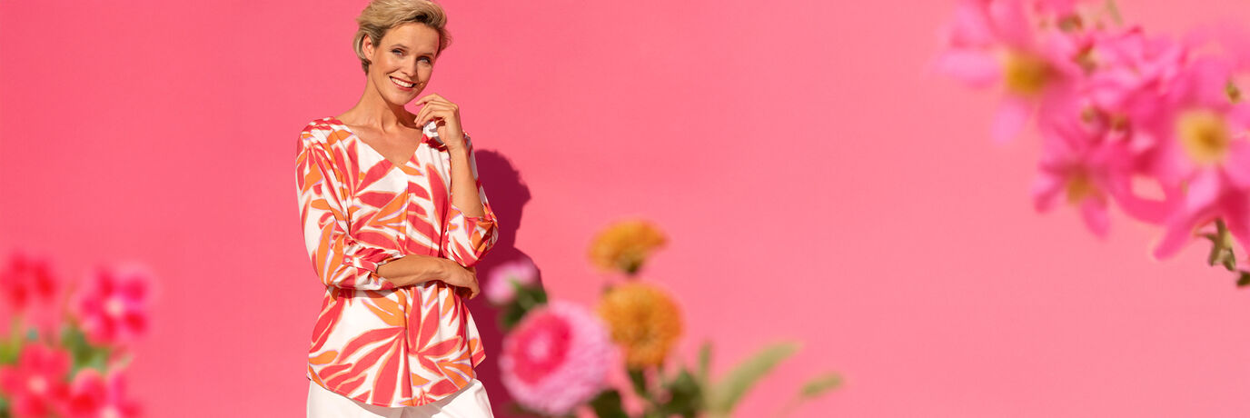 Damesblouse met 3/4 mouwen in oranje-wit