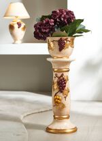 Kolom met plantenbak met bladgoud 