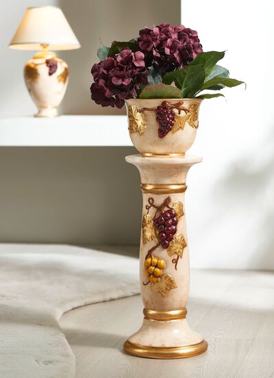 Kolom met plantenbak met bladgoud 