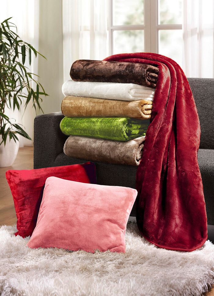 Premium dekens en kussens met kasjmiergevoel CR&Egrave;ME