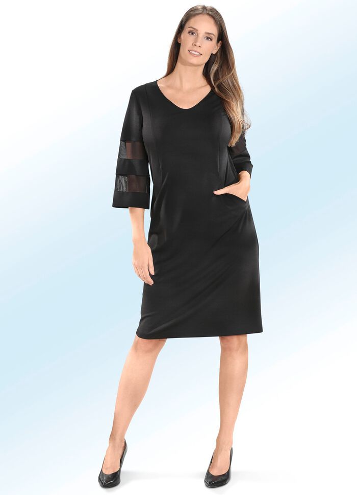 Jurk met trompetmouwen 