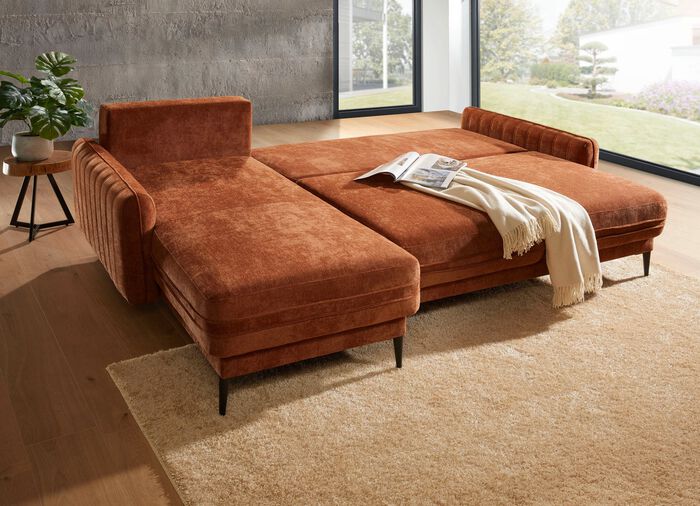 Gestoffeerde hoek met bedfunctie en bedkast 