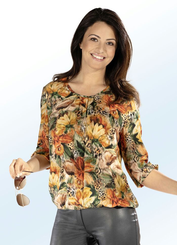 Mooie tuniek met bloemendessin 