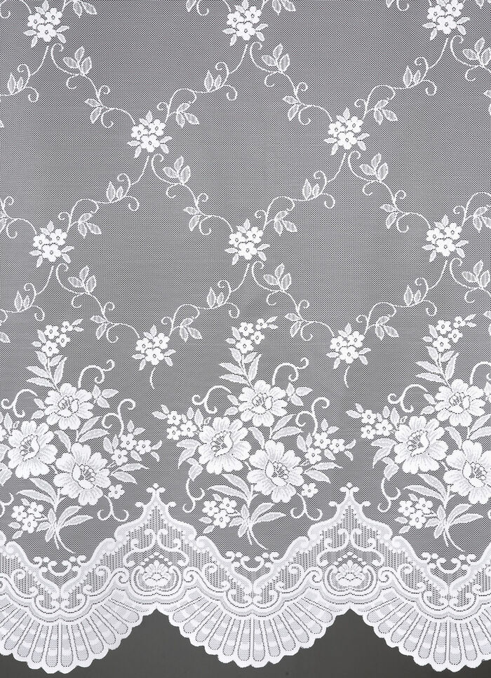 Siervitrageset met embrasse voorzien van een bloesemdessin 