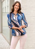 Tuniek met lusknoopsluiting 