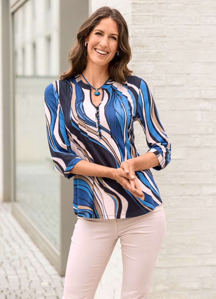 Tuniek met lusknoopsluiting 