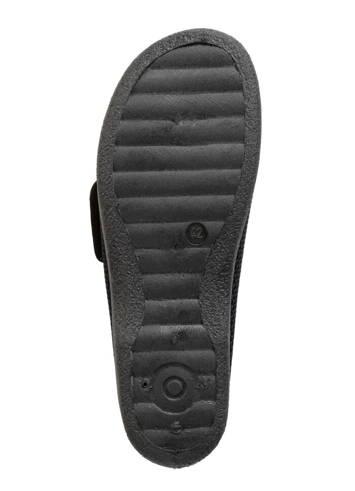 Slippers gemaakt van gewatteerd textielmateriaal 