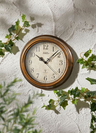 Radiografische wandklok met bronzen behuizing 