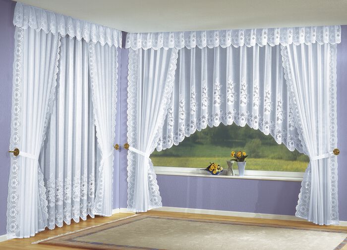 Overgordijnenset met geborduurde boord aan beide zijden 