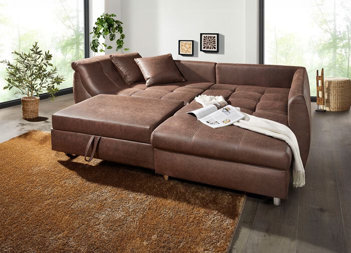 Vrijstaande gestoffeerde hoekbank met bedfunctie BRUIN