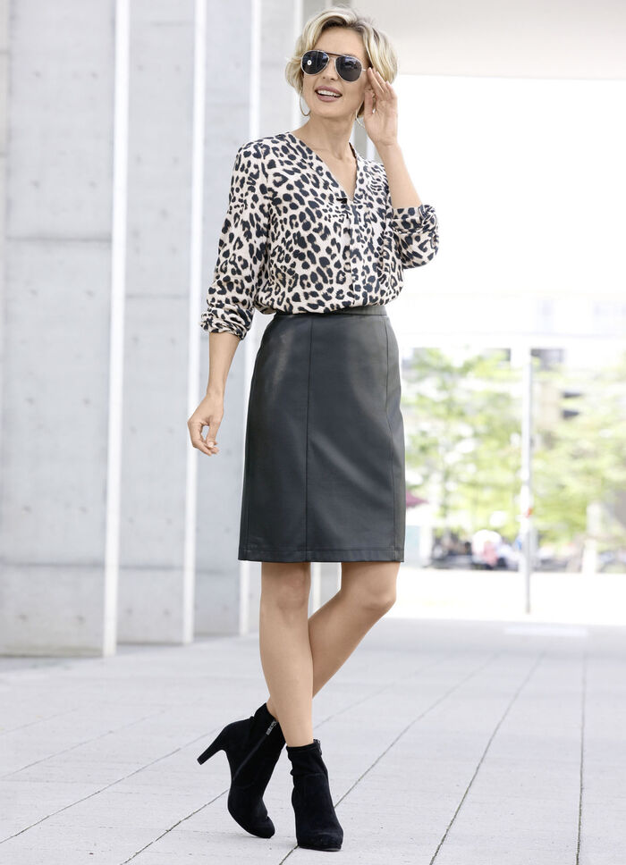 Tuniek met decoratieve bies 