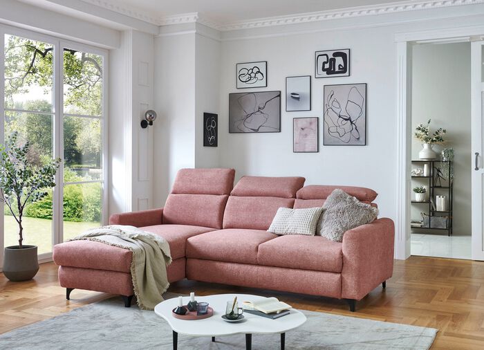 Comfortabele gestoffeerde hoekbank met bedfunctie 