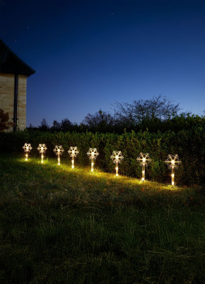 Set van 8 sneeuwvlokzonnepluggen 