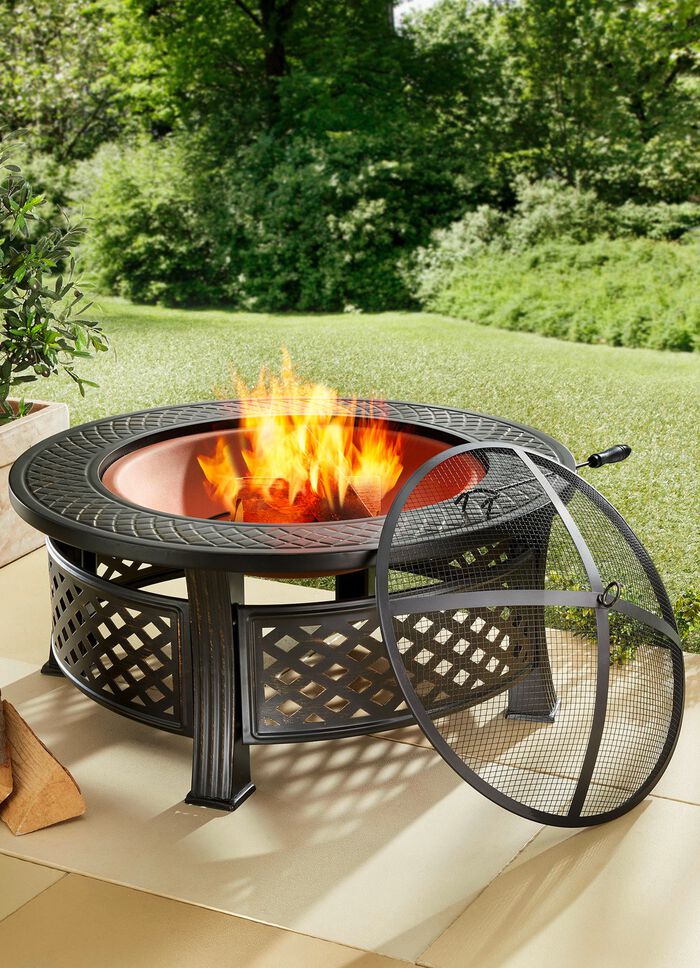 Vuurplaats met roosterdeksel en pook 