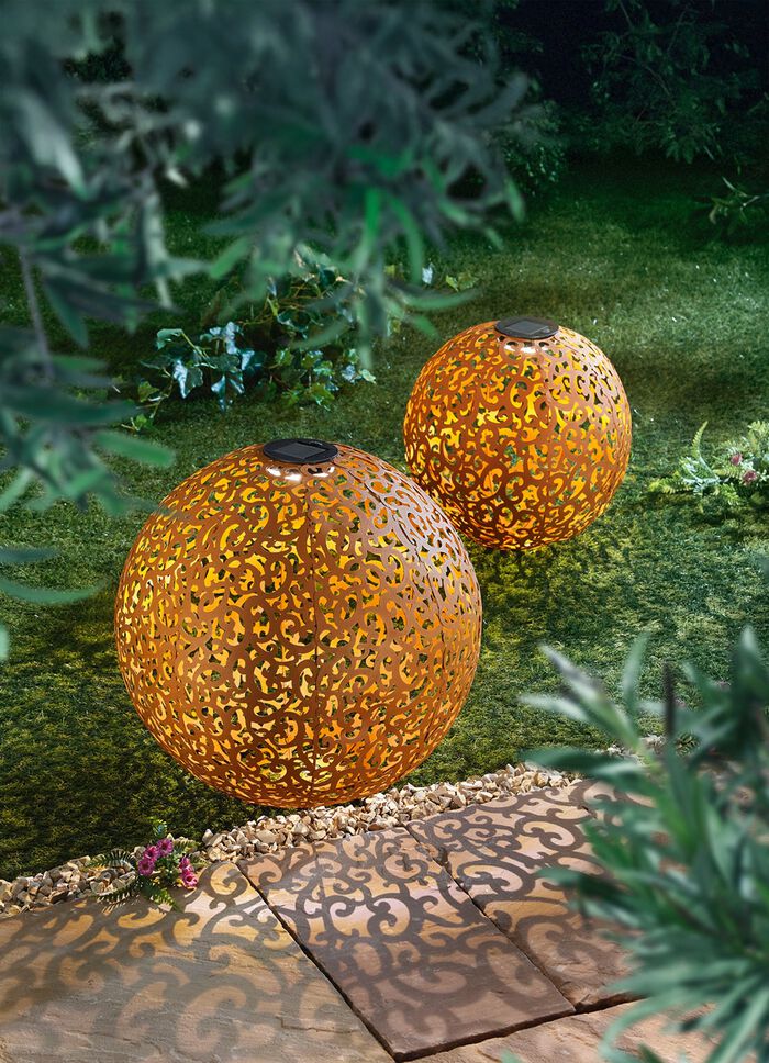 Zonnebol van roestkleurig metaal 