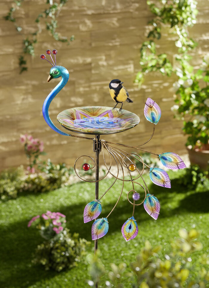 Vogelbad in de vorm van een pauw 