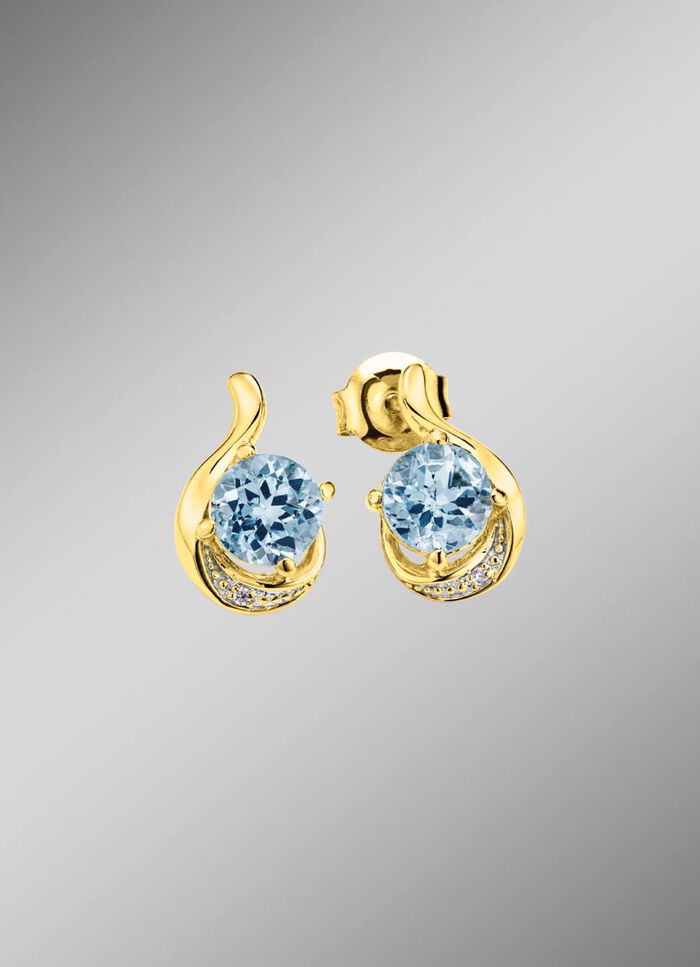 Stralende glans: oorbellen met blauwe topaas en synthetische zirkonia 