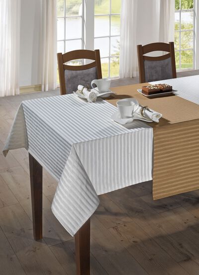 Fijne tafel- en kamerdecoratie met een glanzend gestreept dessin 