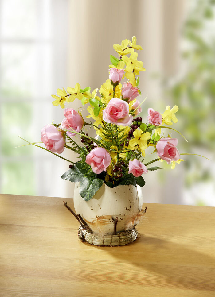 Arrangement met hyacinten en minirozen in een eierpot