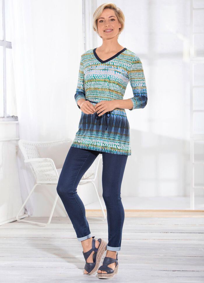 Prachtige tuniek met riemlussen en strikceintuur 