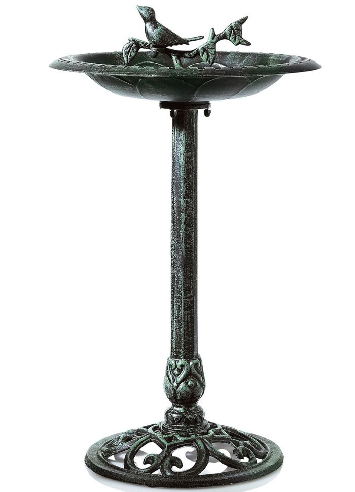 Vogeldrinkplaats met schaal van ijzer 