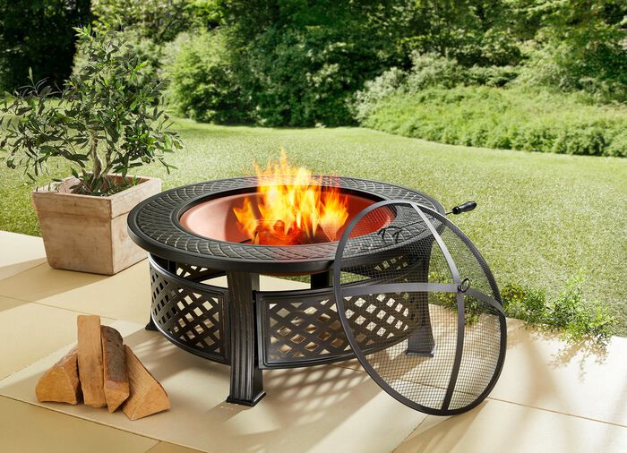 Vuurplaats met roosterdeksel en pook 